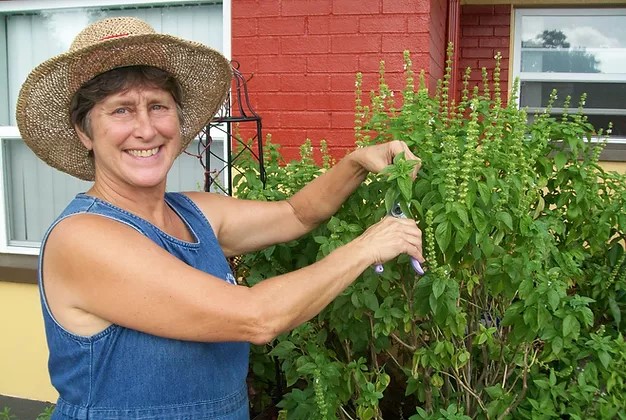 Organic Living owner in her garden